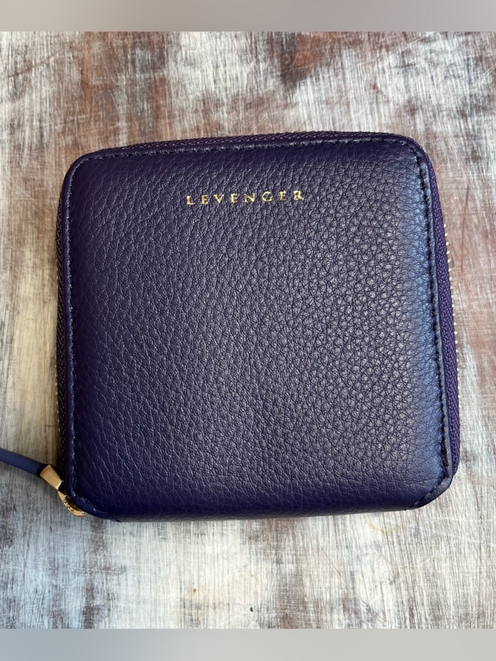 Levenger Purple Pebbled Leather Zip Around Wallet Compact Card Holder
Gold Logo